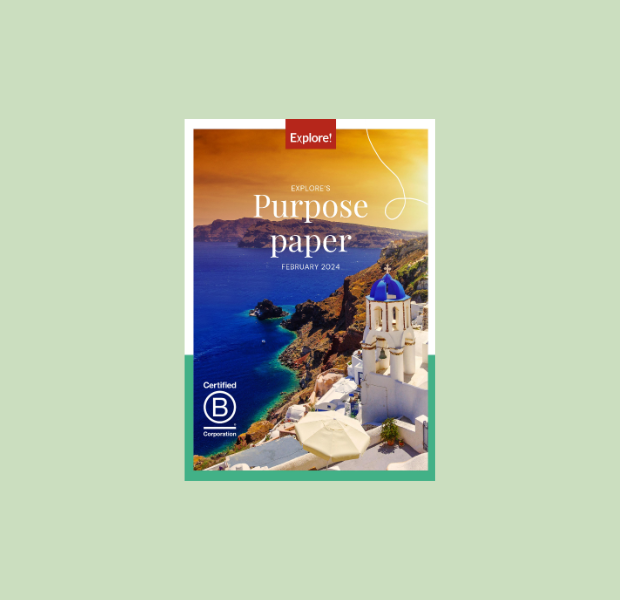 A colorful magazine cover features a coastal landscape with white buildings and blue domes. Text reads “Explore! EXPLORE’S Purpose paper FEBRUARY 2024,” and displays a “Certified B Corporation” logo.