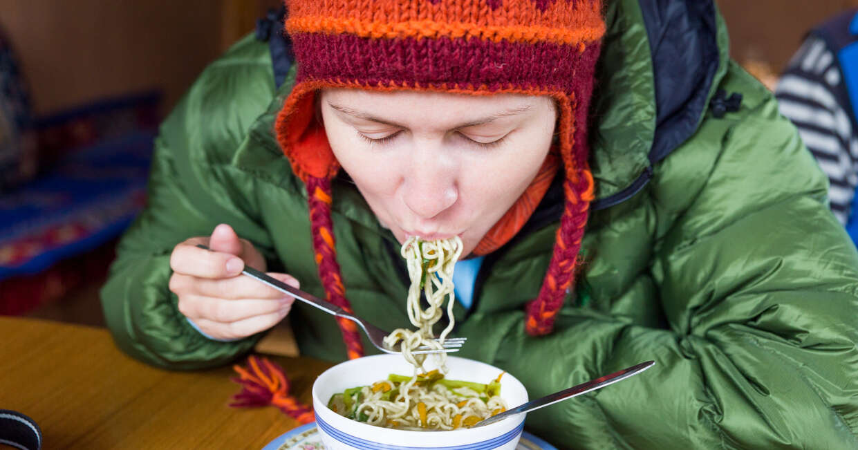 Tucking into cuisine at a local guesthouse in Nepal
