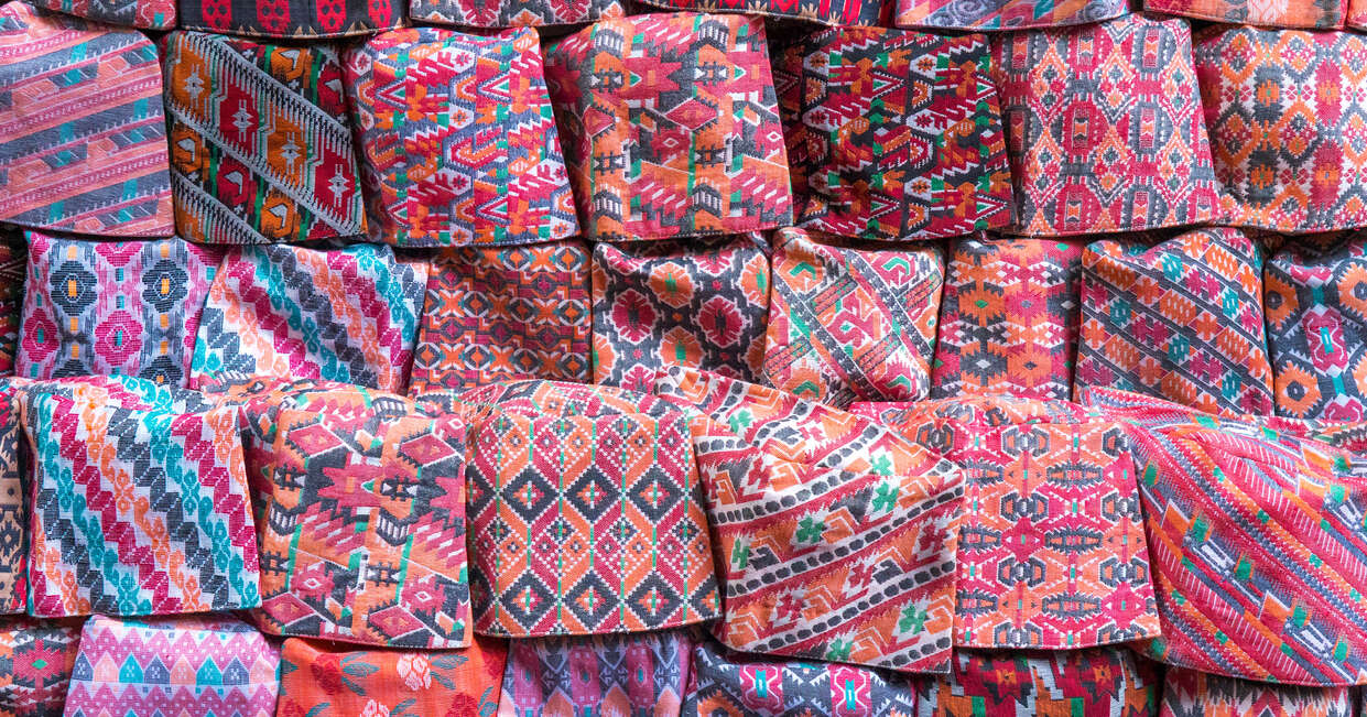 Patterned hats for sale at a market stall in Kathmandu, Nepal
