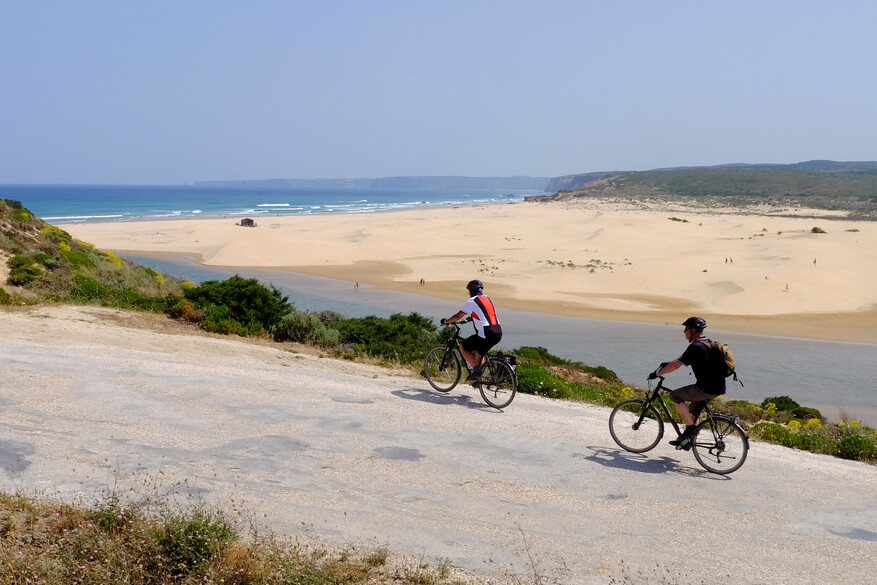 Cyclists by the beach
