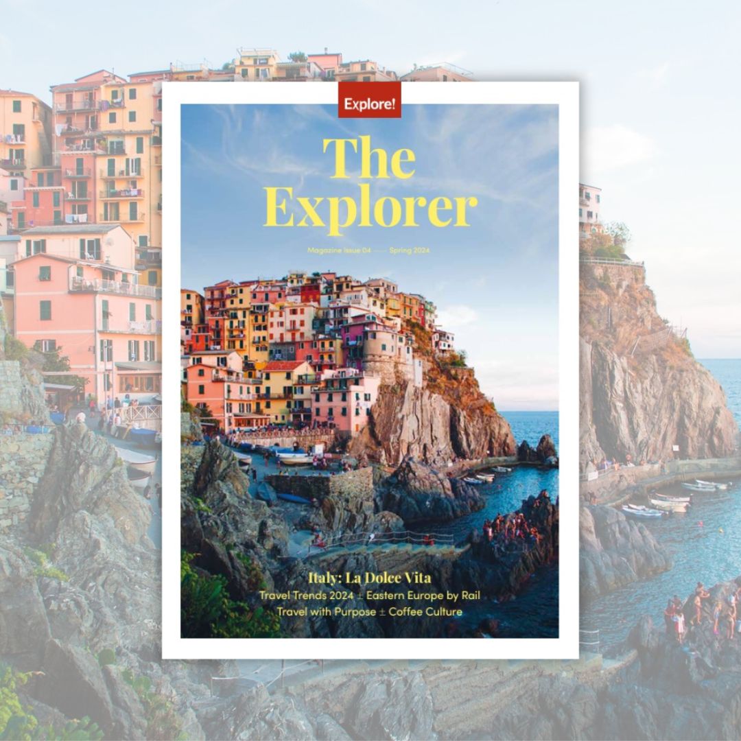 Magazine cover titled "The Explorer" features colorful cliffside buildings above a rocky shore. Text includes: "Explore!", "Magazine Issue 04 - Spring 2024", "Italy: La Dolce Vita", "Travel Trends 2024", "Eastern Europe by Rail", "Travel with Purpose", "C